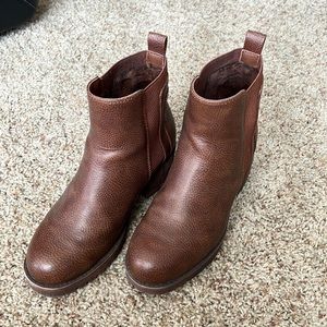 Brown heeled MIA boots.